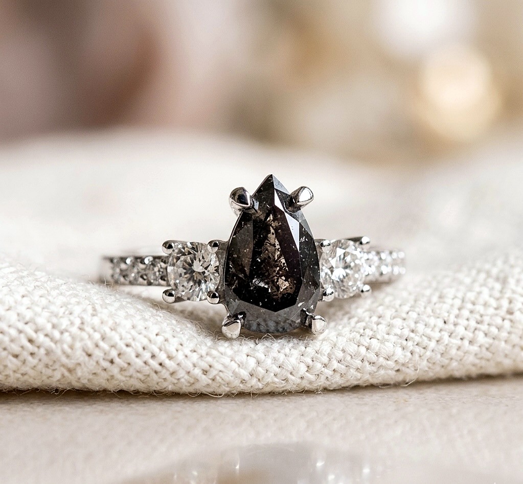 Salt and pepper pear diamond ring
